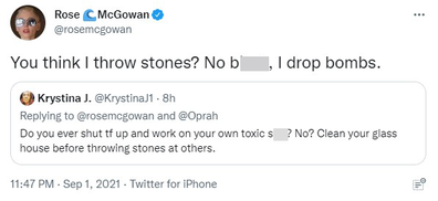 Rose McGowan hits back on Twitter after being told to stop 'throwing stones at others'.