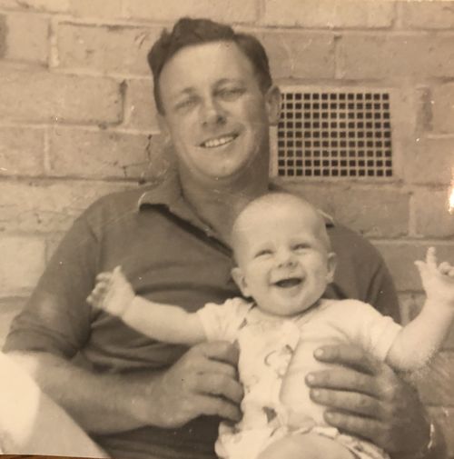 Brett McLeod as a baby with his father Doug.