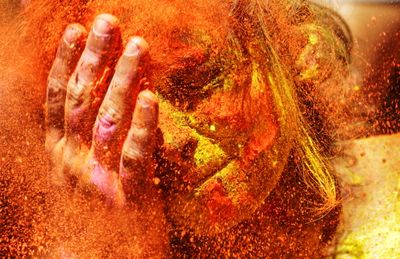 Holi Festival is celebrated by people throwing coloured powder and coloured water at each other.  