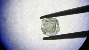 Miners in Russia have made a rare discovery, unearthing a hollow diamond with another diamond inside.