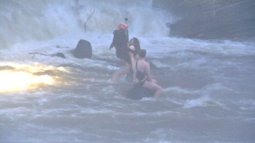 The couple were trapped in the Abbottsford reserve and needed to be rescued by a helicopter.