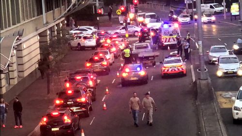 The arrest shut down a Darling Harbour street.