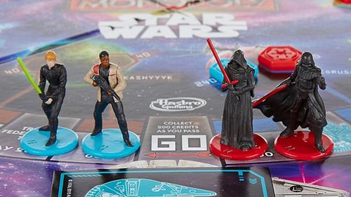 The game includes four all-male pieces, including Darth Vader who is not featured in the film. (Hasbro)