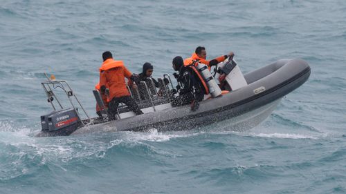 Indonesia expands search for AirAsia bodies
