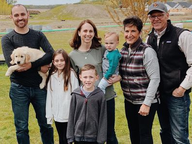 The Williams family with Marvel and members of Rolling Oaks Golden breeding.