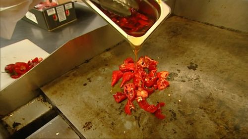 It's so hot, customers have to sign a waiver before they eat it. (9NEWS)