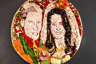 UK pizza chain, Papa John's, created this Kate and Wills pizza in celebration of the Royal wedding.