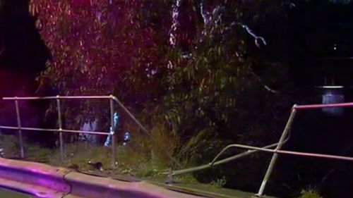 The woman crashed her car through the barrier about 12.30am. (9NEWS) 