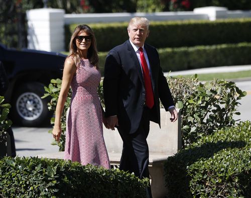 The couple walked hand-in-hand despite rumours of their relationship being on the rocks. (AAP)