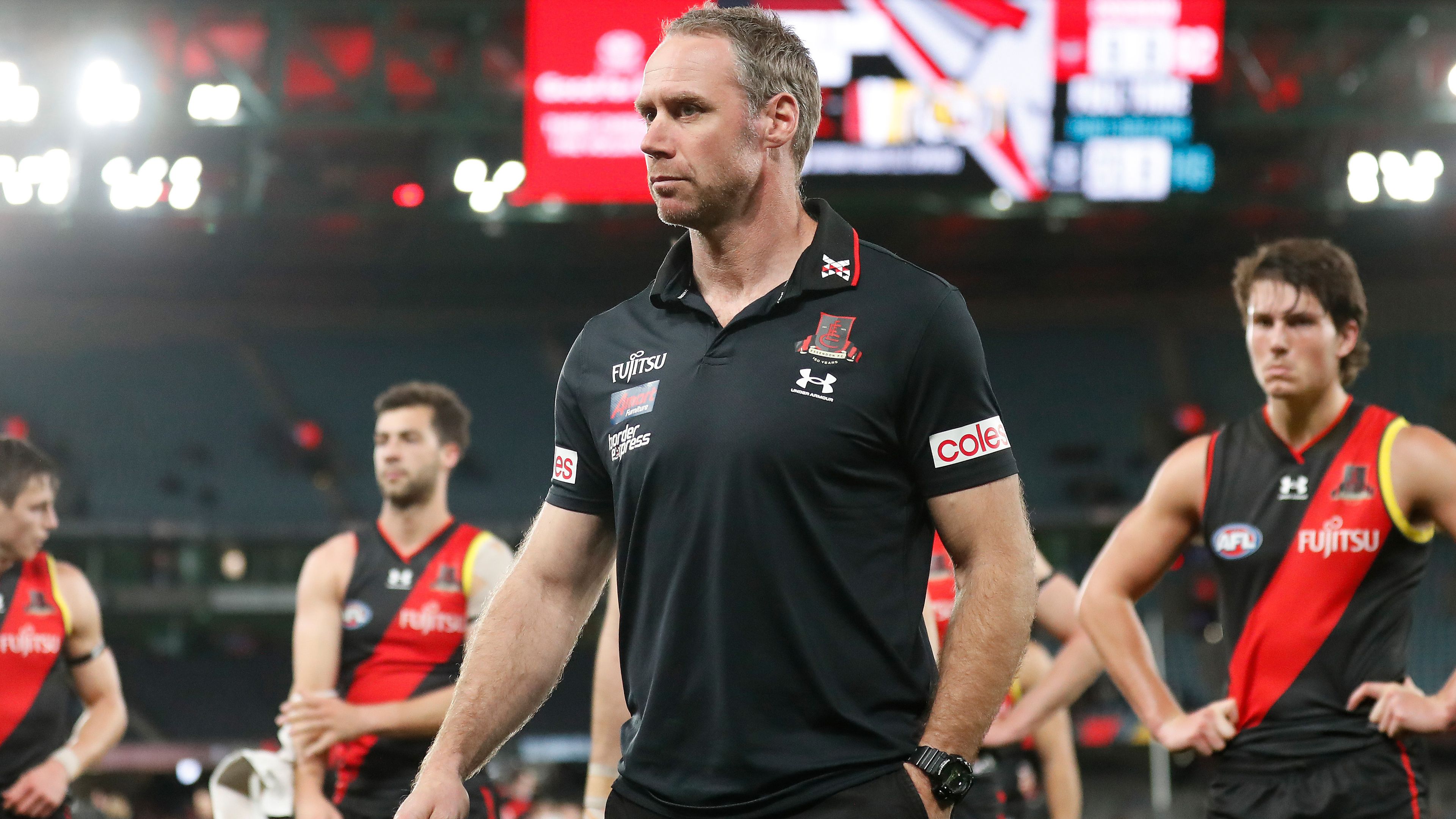  Ben Rutten, Senior Coach of the Bombers looks dejected after a loss during the 2022 AFL Round 22 match between the Essendon Bombers and the Port Adelaide Power at Marvel Stadium on August 14, 2022 in Melbourne, Australia. (Photo by Michael Willson/AFL Photos via Getty Images)