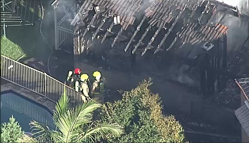 Aerial shots of the house fire shows the charred remains of the property's roof. Picture: 9NEWS.