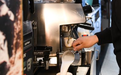 Barista making coffee