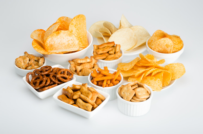 Variety of different chips, crackers and pretzels 