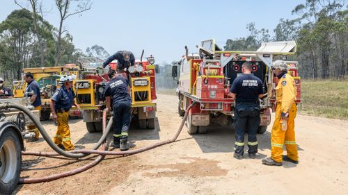 Firefighters will today continue to battle the Captain Creek bushfire after residents in Winfield were evacuated overnight amid a strong wind change.