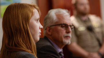 Tilli Buchanan (left) sits in court with Randy Richards (right) her attorney, during deliberations in a case where Buchanan was charged with criminal lewdness involving a child.