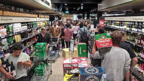 The line at Dan Murphy's in Brunswick on Sunday.