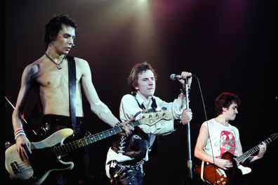 The Sex Pistols - Sid Vicious, Johnny Rotten and Steve Jones performing