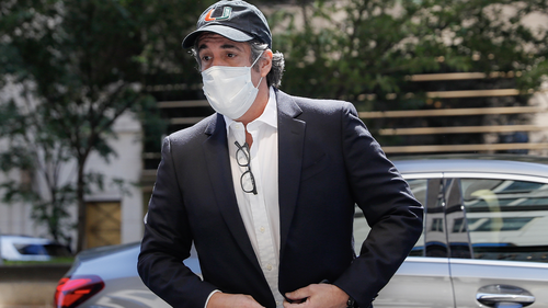 FILE- In this May 21, 2020 file photo, Michael Cohen arrives at his Manhattan apartment in New York after being furloughed from prison because of concerns over the coronavirus. 