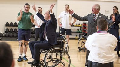 The Duke of Cambridge gets the ball through the hoop while playing wheelchair basket ball during a visit to the Defence Medical Rehabilitation Centre Stanford Hall, Stanford on Soar, Loughborough