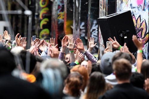 Selective fans gather for a performance of Ed Sheeran in Hosier Lane. (AAP)