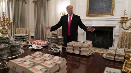 Donald Trump served fast food to college athletes because the White House kitchen staff are unable to work.