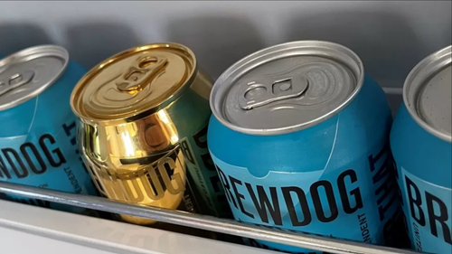 Gold-plated cans produced by BeerDog and included in the promotion.