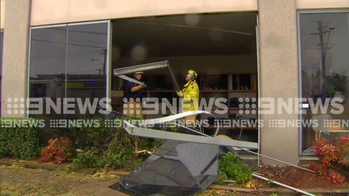 There could have been major structural damage to the shop if the car hit a pillar just centimetres away. (9NEWS)