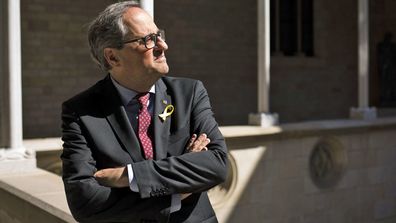 President of the Catalonia regional government, Quim Torra, poses for a photo at the Palau de la Generalitat in Barcelona, Spain. (photo: June 25, 2018)