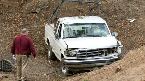 Investigators view a pickup truck involved in a deadly shooting rampage at the Rancho Tehama Reserve. (AAP)