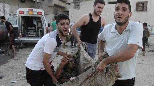 Strike on Gaza market kills 17 during supposed humanitarian truce
