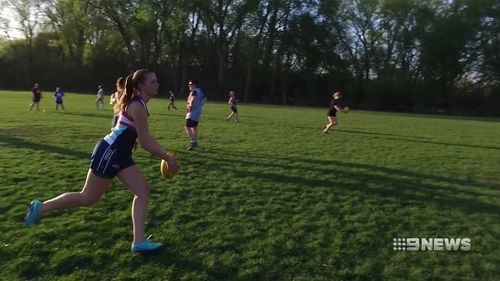 "I think Australian rules footballers are the fittest and strongest athletes in the world," Andrea Mattison says during a pre-season training session.

