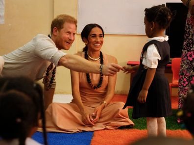 ABUJA, NIGERIA - MAY 10:  (EDITORIAL USE ONLY) Prince Harry, Duke of Sussex and Meghan, Duchess of Sussex visit Lightway Academy on May 10, 2024 in Abuja, Nigeria. (Photo by Andrew Esiebo/Getty Images for The Archewell Foundation)