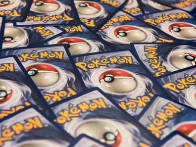 Pokemon cards laid out with the logo facing out.
