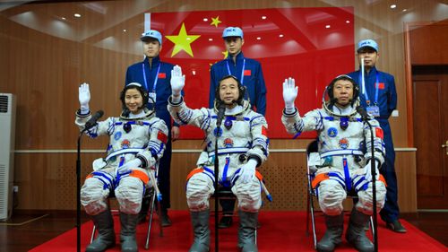 The crew of the Tiangong-1 before its 2012 launch. (Photo: AP).