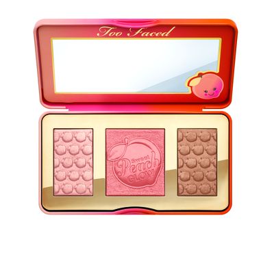 <a href="http://mecca.com.au/too-faced/" target="_blank">Sweet Peach Glow Peach-Infused Highlighting Palette, $61.</a>