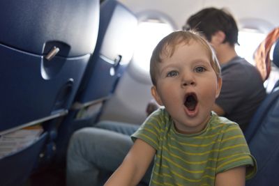 I'm taking my kids on a long-haul flight, what should I do?
