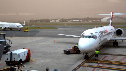 Planes on the tarmac at at Canberra Airport.