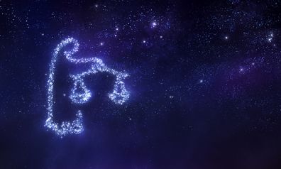 Libra zodiac sign on space background