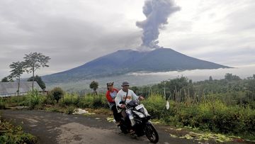 Volcano kills 11 climbers, erupts again to halt rescue efforts