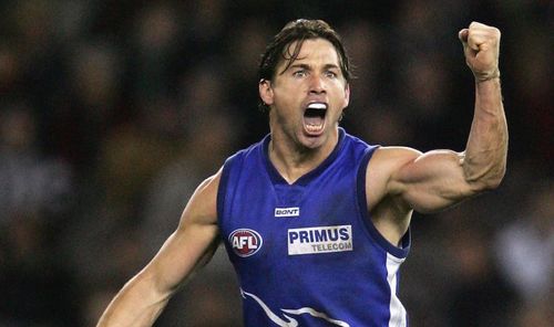 Grant played 301 AFL games, including 243 for North Melbourne, and won the club's best and fairest award in 2001. (AAP)
