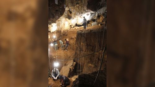 The cave was occupied by early humans for about 50,000 years, archaeologists believe. The cave was occupied by early humans for about 50,000 years, archaeologists believe.