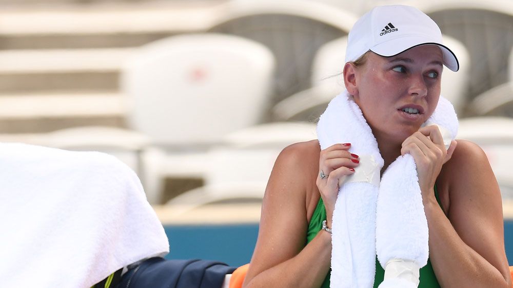 Caroline Wozniacki battled the heat at Sydney Olympic Park. (AAP)