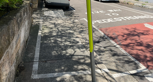A Sydney council has marked parking spaces on footpaths to allow for more parking.