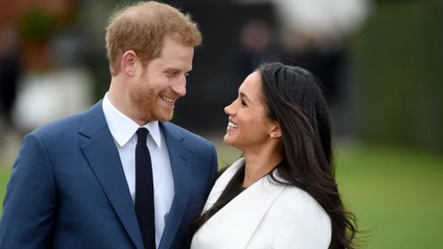 Britain's Prince Harry and his fiancee Meghan Markle pose after announcing their engagement. (AAP)