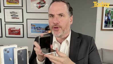 'Hello, it's a phone that flips in half,' Long said, gleefully snapping the phone down.