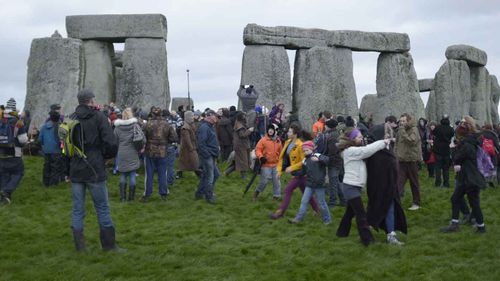 Crowds gather around Stonehenge during last year's Winter Solstice. (PA Wire)