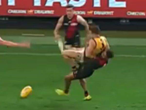 Essendon’s Dempsey charged over horror tackle