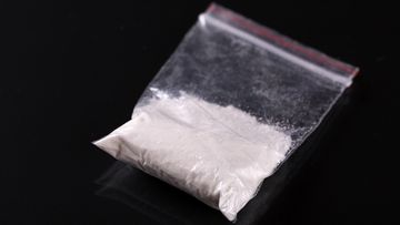 A small baggie of cocaine.