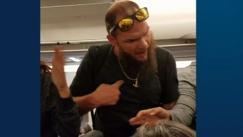 An irate Matthew Silvay confronts Timothy Manley while still on flight (ABC AMERICA) 