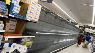 An empty aisle in the St Ives, Woolworths store, where the toilet paper should be.
